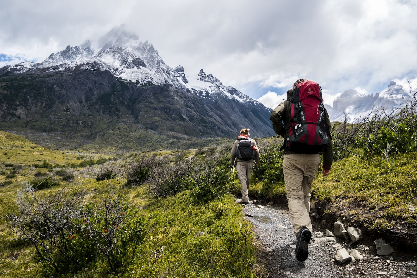 Hikers traversing volcanic terrain in the Canary Islands